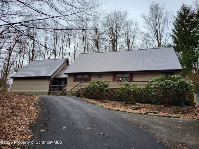 1445 Heart Lake Rd, Scott Twp, PA 18433 - view of front of property featuring a metal roof and asphalt driveway