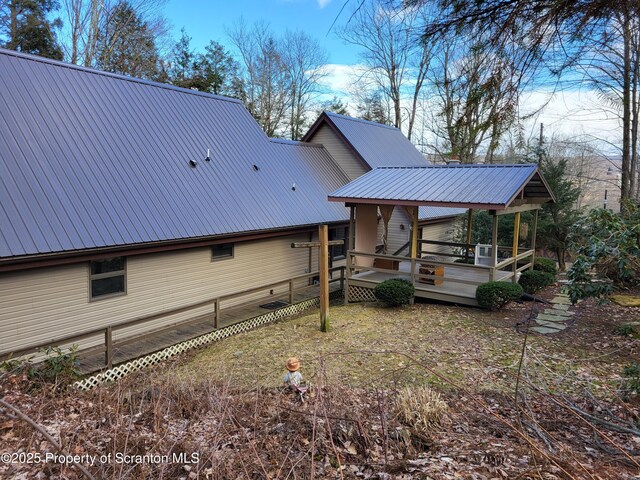 1445 Heart Lake Rd, Scott Twp, PA 18433 - rear view of property featuring a metal roof