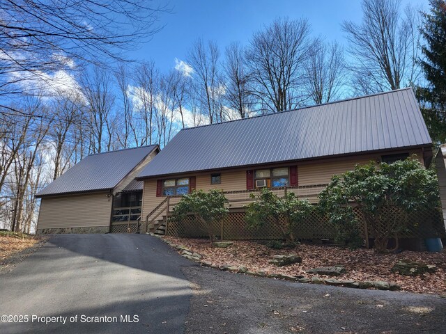 1445 Heart Lake Rd, Scott Twp, PA 18433 - chalet / cabin with a metal roof and asphalt driveway
