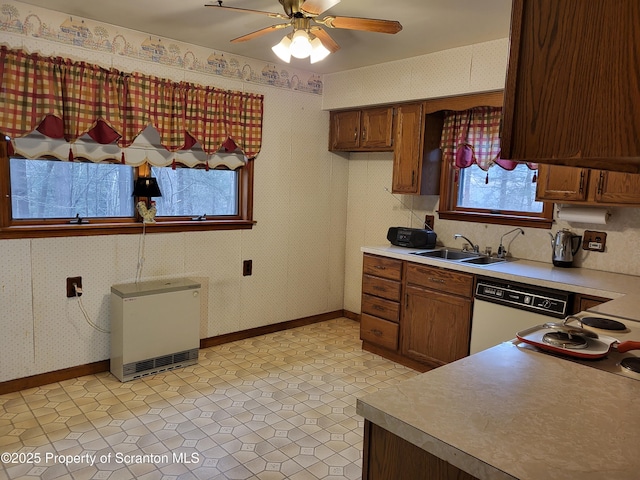 1445 Heart Lake Rd, Scott Twp, PA 18433 - kitchen featuring dishwasher, ceiling fan, heating unit, and light countertops