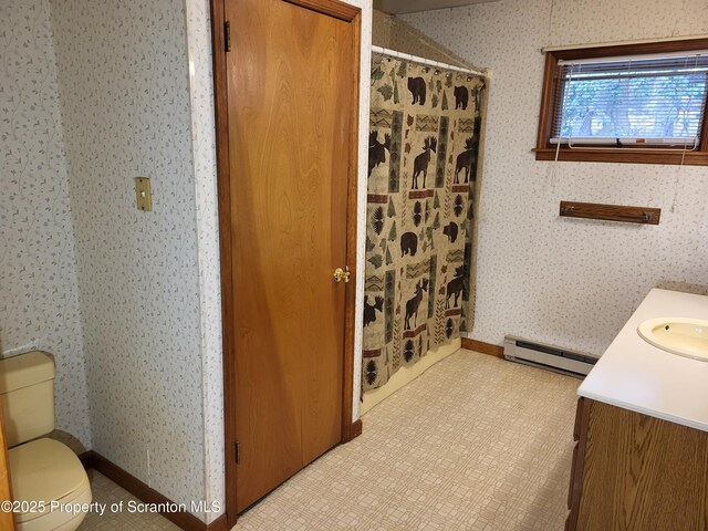 1445 Heart Lake Rd, Scott Twp, PA 18433 - bathroom with a baseboard heating unit, wallpapered walls, vanity, and a shower with curtain