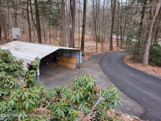 1445 Heart Lake Rd, Scott Twp, PA 18433 - view of street featuring street lighting and a wooded view