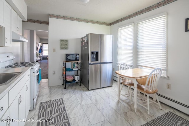 kitchen with stainless steel fridge with ice dispenser, black microwave, white gas range, white cabinetry, and light marble finish flooring