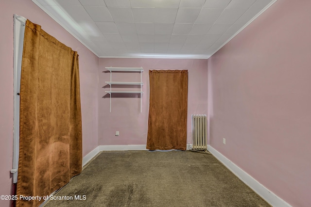 445 Leggett St, Scranton, PA 18508 - unfurnished bedroom with radiator, crown molding, and carpet