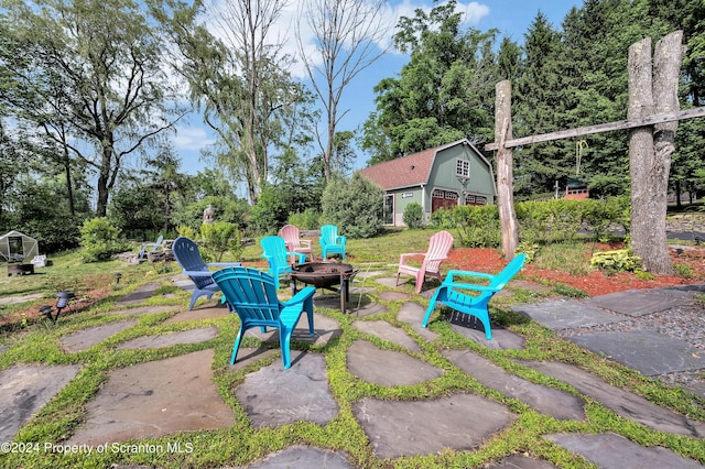 view of patio featuring a fire pit