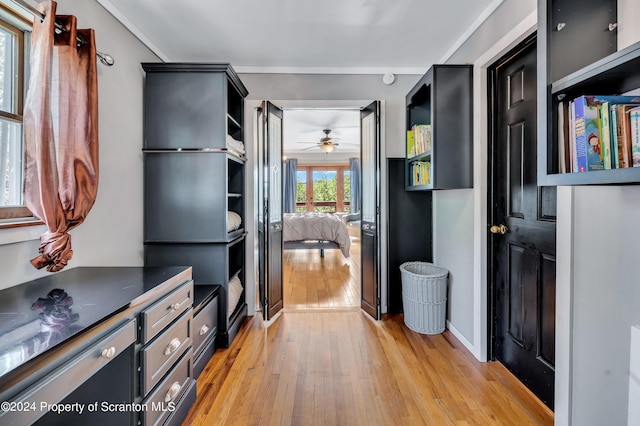 hall with light hardwood / wood-style flooring