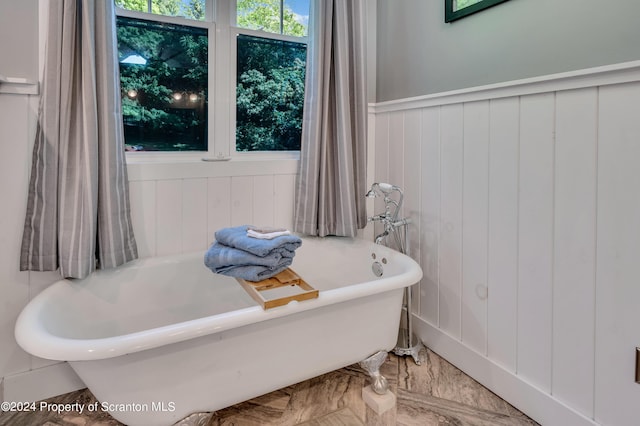 bathroom with a tub