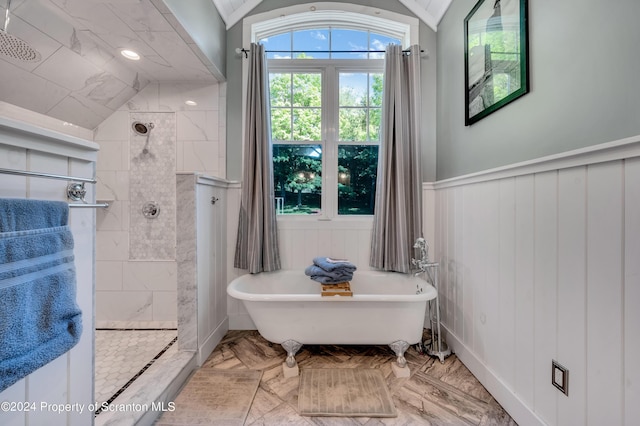 bathroom with separate shower and tub and lofted ceiling