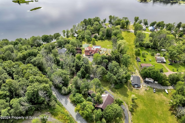 birds eye view of property featuring a water view