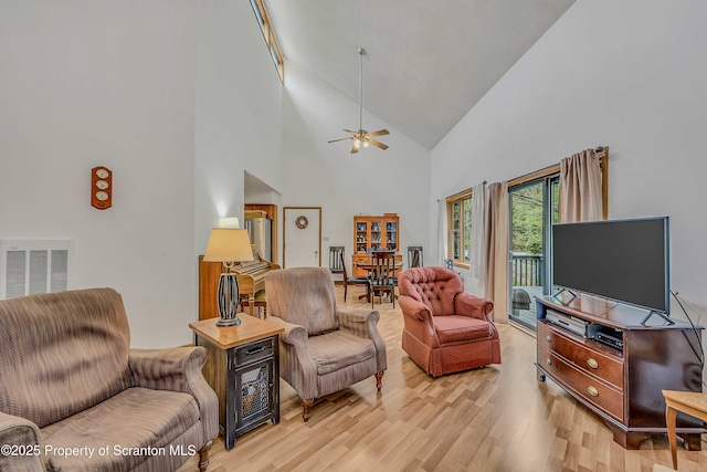 582 Lakeview Dr W, Lake Ariel, PA 18436 - living room with light wood-style flooring, high vaulted ceiling, and a ceiling fan