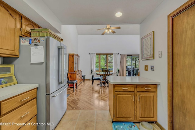 582 Lakeview Dr W, Lake Ariel, PA 18436 - kitchen with light countertops, a ceiling fan, high end refrigerator, brown cabinets, and recessed lighting
