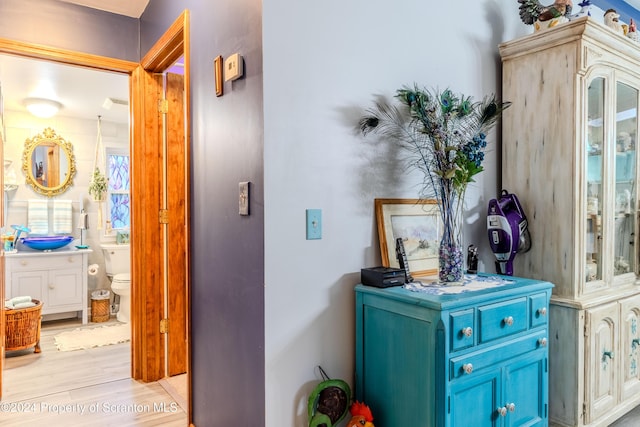 hallway with light wood-type flooring