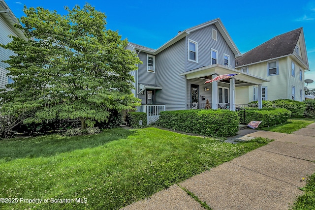 506 N Sumner Ave, Scranton, PA 18504 - view of front of house with a porch and a front yard