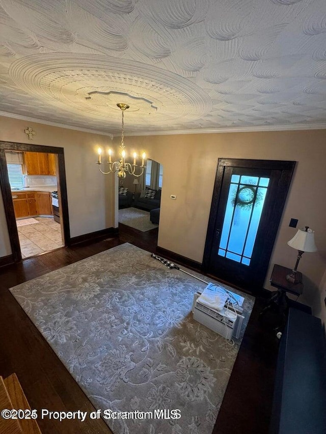 506 N Sumner Ave, Scranton, PA 18504 - foyer with a chandelier, wood finished floors, and crown molding