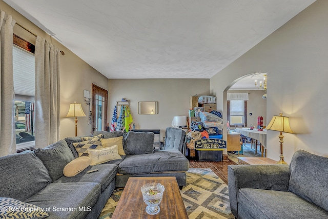 506 N Sumner Ave, Scranton, PA 18504 - living area featuring wood finished floors and arched walkways