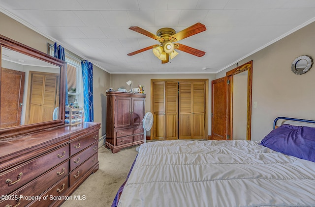 506 N Sumner Ave, Scranton, PA 18504 - bedroom featuring light colored carpet, a closet, crown molding, and a ceiling fan