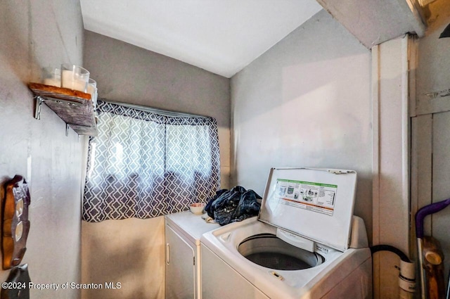 laundry area with washing machine and dryer