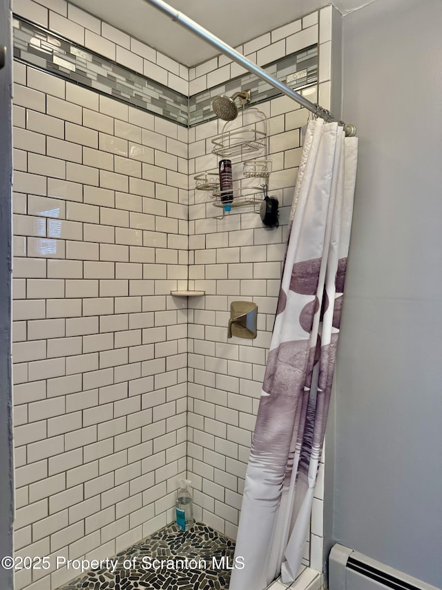 918 Hemlock St, Scranton, PA 18505 - bathroom featuring a baseboard heating unit and a tile shower