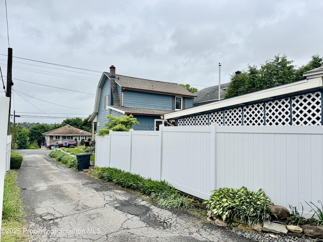 918 Hemlock St, Scranton, PA 18505 - view of home's exterior featuring a chimney