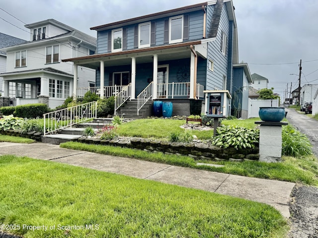 918 Hemlock St, Scranton, PA 18505 - american foursquare style home featuring covered porch and a front lawn