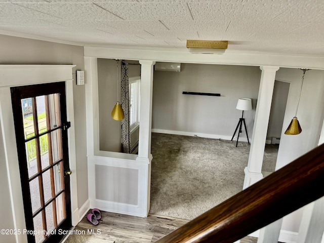 918 Hemlock St, Scranton, PA 18505 - foyer entrance featuring baseboards, a baseboard heating unit, and ornate columns