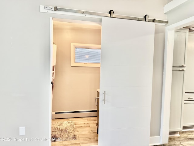 918 Hemlock St, Scranton, PA 18505 - bathroom with baseboard heating and wood finished floors