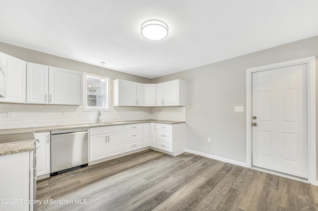 14 Maiden Ln, Susquehanna, PA 18847 - kitchen with dishwasher, decorative backsplash, light wood-style floors, a sink, and white cabinets