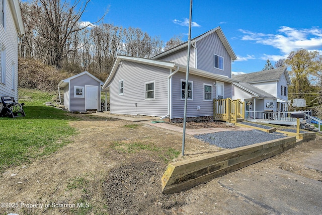 14 Maiden Ln, Susquehanna, PA 18847 - view of side of home featuring a lawn
