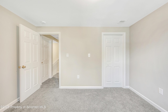 14 Maiden Ln, Susquehanna, PA 18847 - unfurnished bedroom featuring light colored carpet, a closet, and baseboards