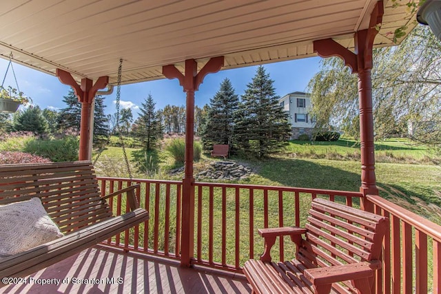 wooden deck featuring a porch