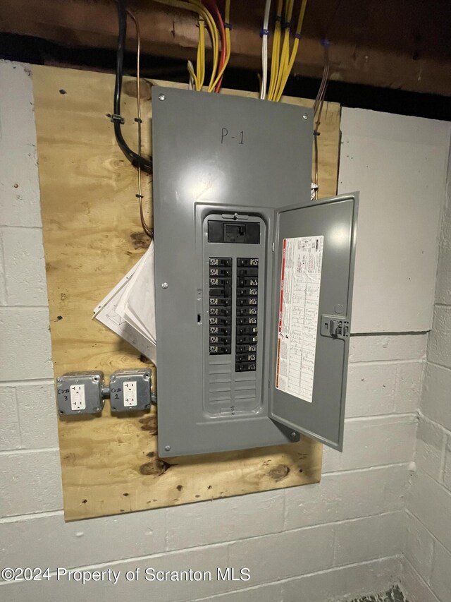 utility room with electric panel