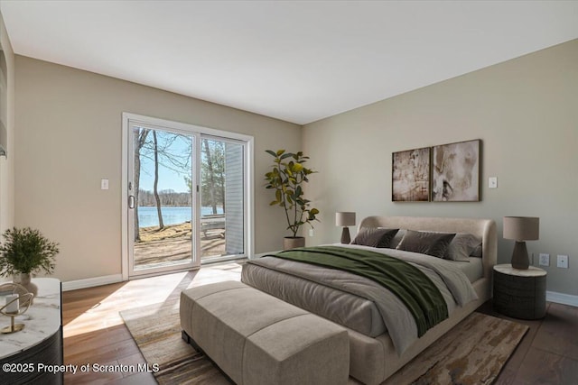 134 Laurel Hill Dr Unit 102, Greentown, PA 18426 - bedroom with access to outside, wood finished floors, and a water view