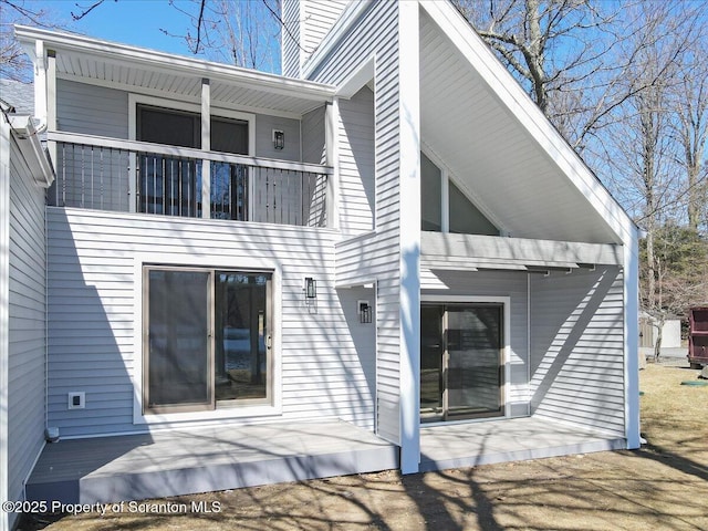 134 Laurel Hill Dr Unit 102, Greentown, PA 18426 - rear view of property with a balcony and a patio