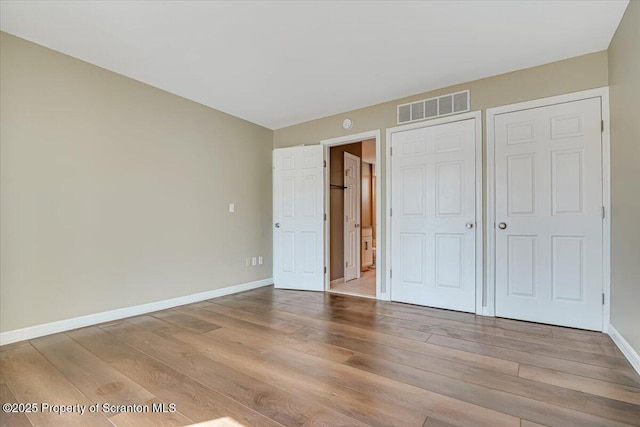 134 Laurel Hill Dr Unit 102, Greentown, PA 18426 - unfurnished bedroom with wood finished floors