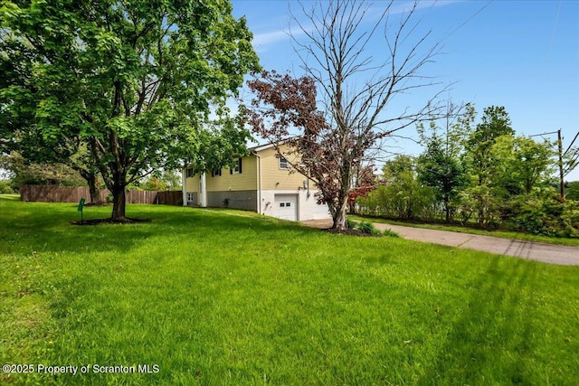 6 Eastview Dr, Scott Twp, PA 18411 - view of yard featuring an attached garage and driveway