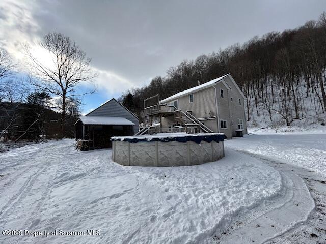 view of snow covered property