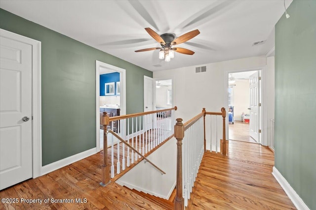 hallway featuring light hardwood / wood-style flooring