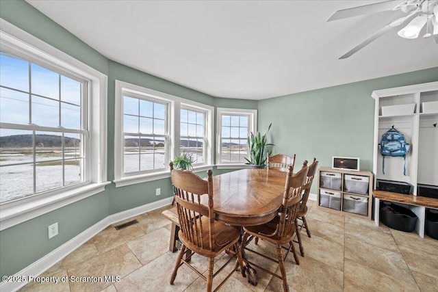 dining room with ceiling fan