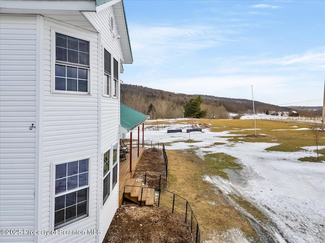 view of yard covered in snow