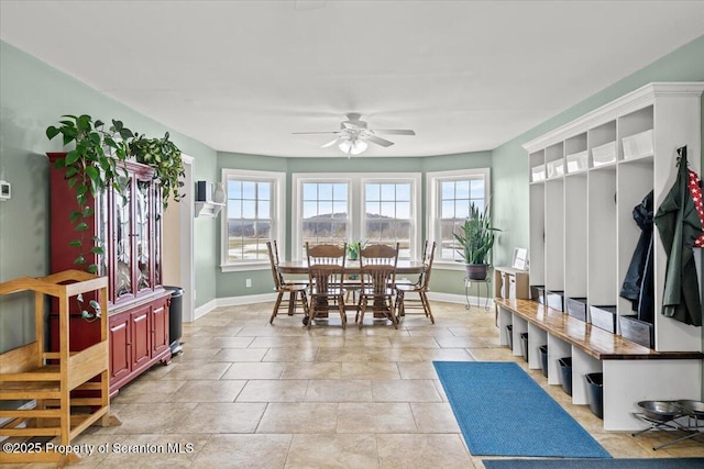 interior space with ceiling fan and a healthy amount of sunlight