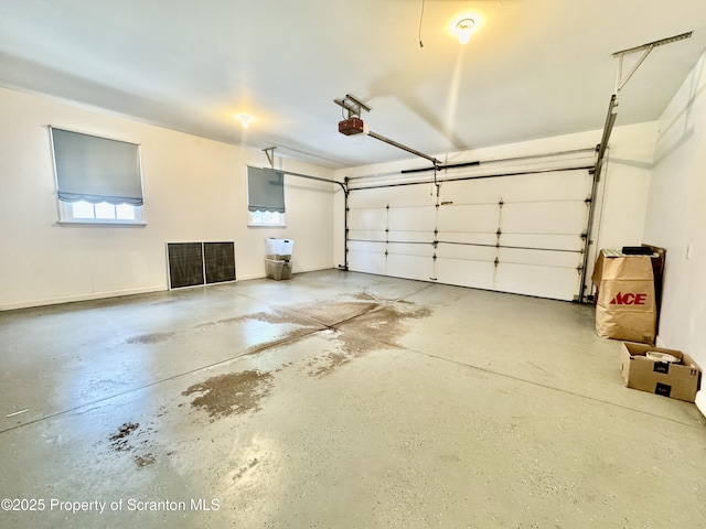 13 Forest Glen Dr, Scranton, PA 18504 - garage featuring a garage door opener