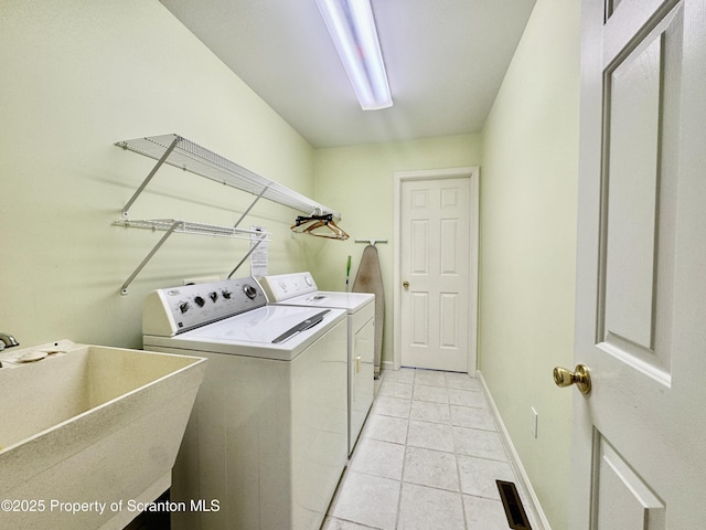 13 Forest Glen Dr, Scranton, PA 18504 - laundry room with washing machine and clothes dryer and light tile patterned floors