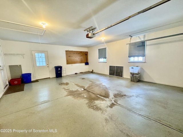 13 Forest Glen Dr, Scranton, PA 18504 - garage with a garage door opener and baseboards