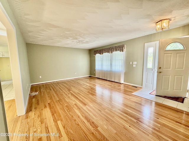 13 Forest Glen Dr, Scranton, PA 18504 - foyer with light wood-style flooring and a chandelier