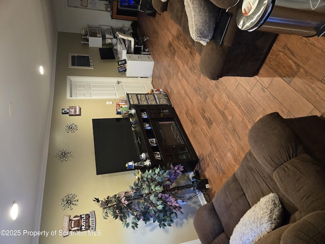 living room with wooden walls