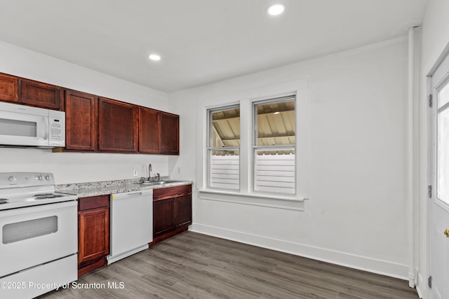 37 Goeringer Ave, Hanover Twp, PA 18706 - kitchen featuring a sink, white appliances, light countertops, reddish brown cabinets, and dark wood-style floors