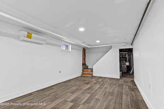 37 Goeringer Ave, Hanover Twp, PA 18706 - basement with a wall unit AC, wood finished floors, stairway, baseboards, and recessed lighting
