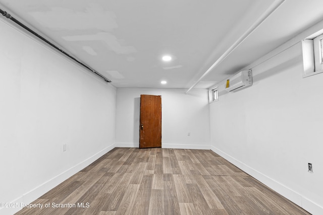 37 Goeringer Ave, Hanover Twp, PA 18706 - below grade area featuring baseboards, recessed lighting, a wall mounted air conditioner, and wood finished floors