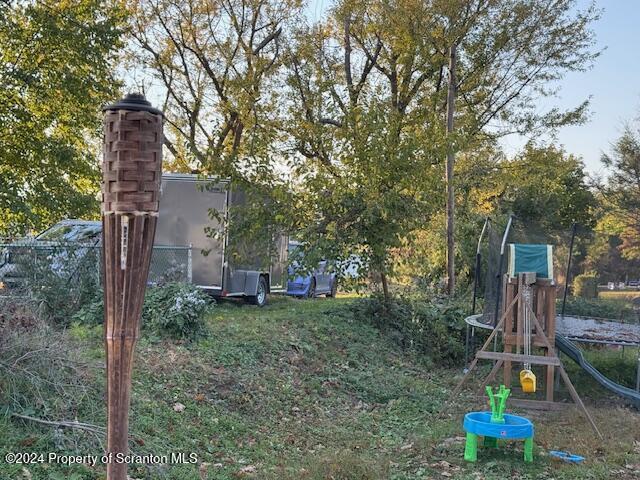 view of yard with a playground