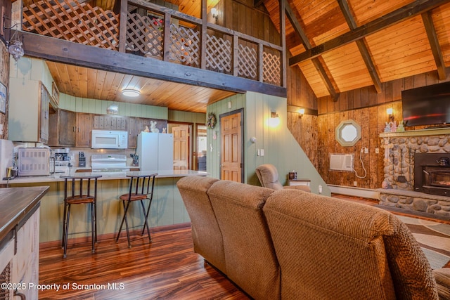 125 Frances Ln, Greentown, PA 18426 - living area with high vaulted ceiling, wooden walls, wooden ceiling, and dark wood-style floors